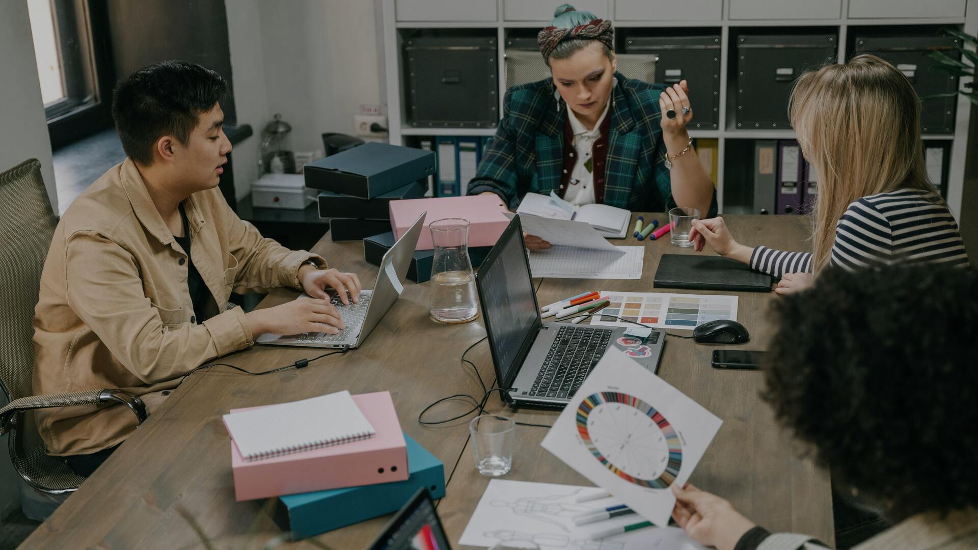 Professionals collaborating in a modern workspace